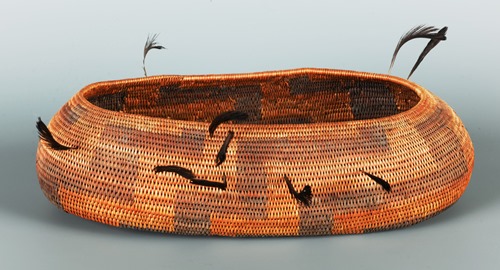 Canoe-shaped bowl with quail topknots, early 20th century, Native American, Californian, Pomo, willow, sedge root, bracken fern root, quail feathers, 1 3/4 × 6 1/4 × 2 1/4in., Gift of the Estate of Robert M. Shields, 2013.4.13. Currently on view in the Native American art galleries, Seattle Art Museum.