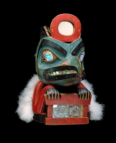 Lkaayaak yeil s'aaxw (Box of Daylight Raven Hat), ca. 1850, Native American, Tlingit, Taku, Gaanax'adi clan, maple, mirror, abalone shell, bird skin, paint, sea lion whiskers, copper, leather, Flicker feathers, 11 7/8 x 7 3/4 x 12 1/4in., Gift of John H. Hauberg, 91.1.124. Currently on view in the Native American art galleries, Seattle Art Museum.