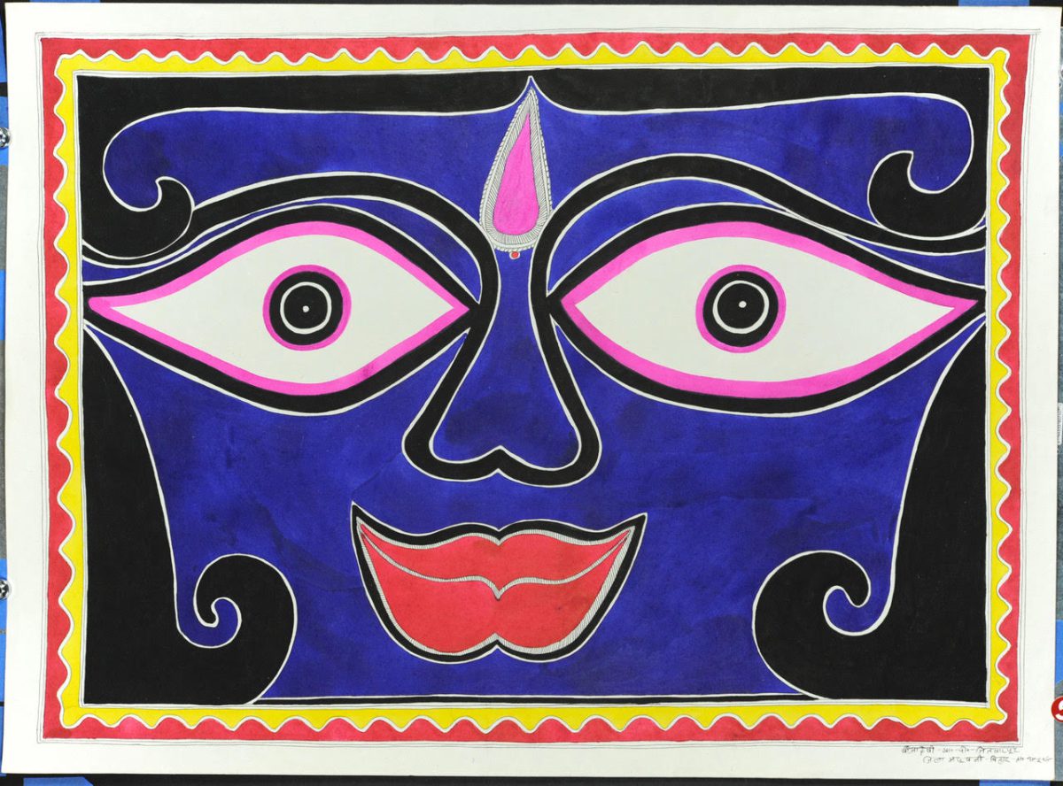 Bold graphic ink-painting depicting a closely-cropped face of Kali, the female deity of destruction in Hinduism. The eyes are large and almond shaped, outlined in bright pink and thick black lines; these eyes stare intently at the viewer. The face's skin is deeply saturated blue, bordered by spirals of black hair. The curves of the hair are mirrored in the outline of the nose which frames a large pink bindi/tikkā in the center of her forehead. The face's lips, nearly the same size as the eyes are bright red in an upward smile. The same shade of red, along with yellow frame the painting in a zig-zag pattern